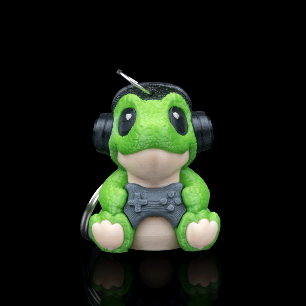 Chaveiro Baby Dinossauro Gamer